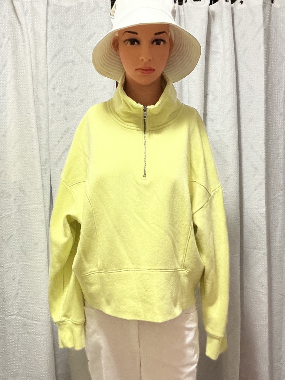Women’s pullover sweat with 3/4 zip up front turtleneck.